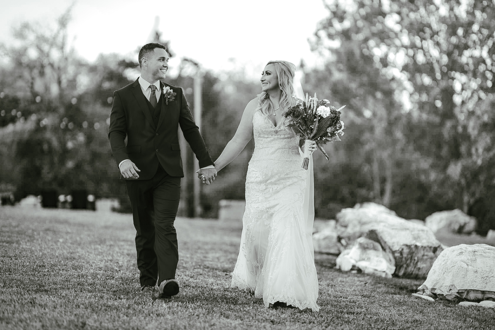 Bride and Groom are walking at Bethel Rock Wedding Venue