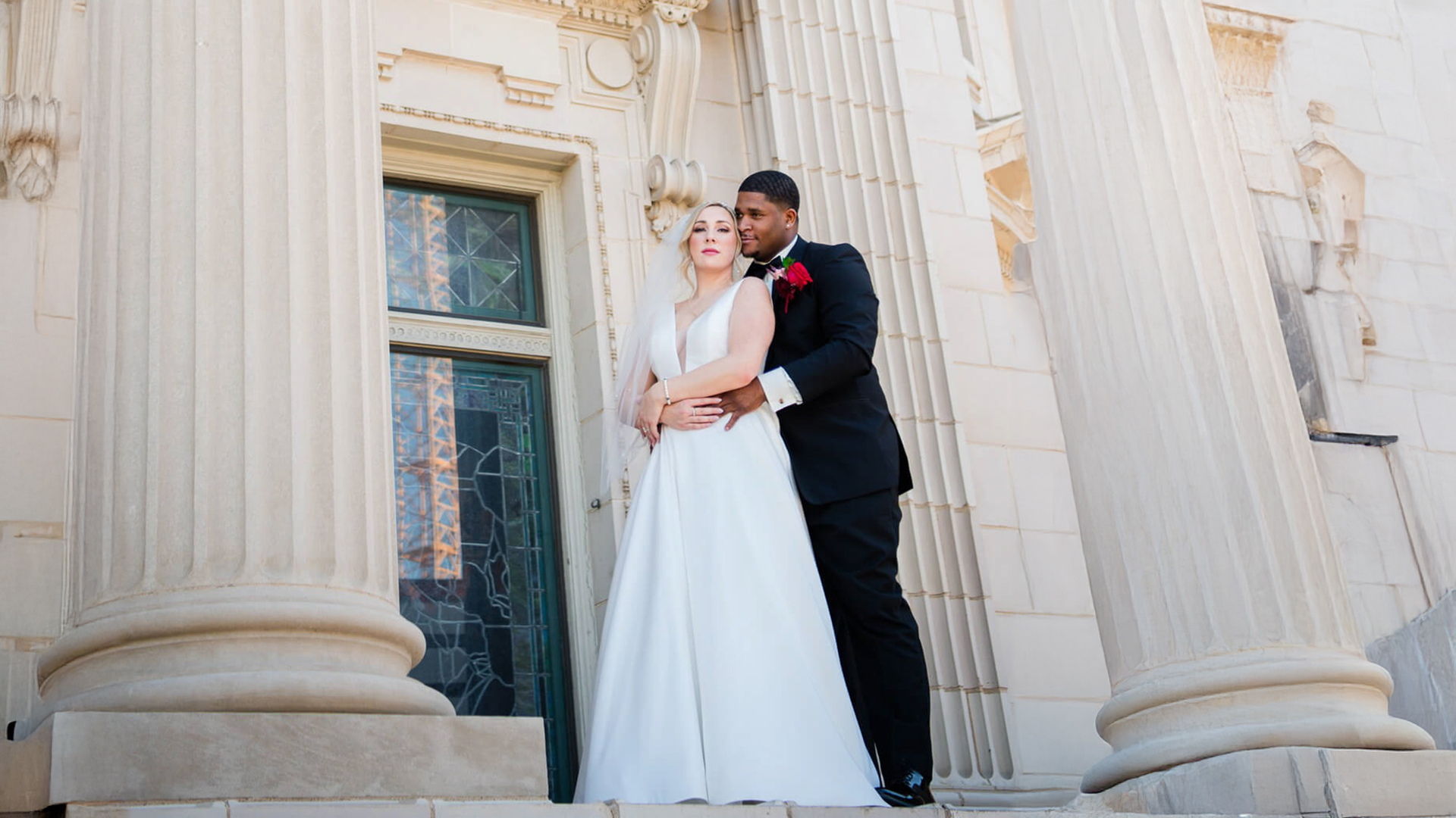 A bride and groom posing at the Carslile Room Dallas