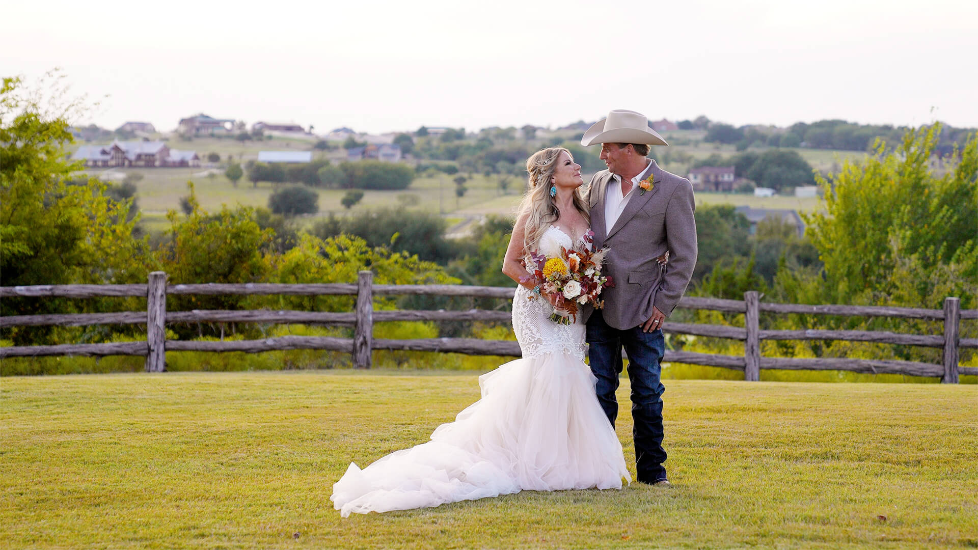 Bride and groom posing at the beautiful Diamond H3 Ranch