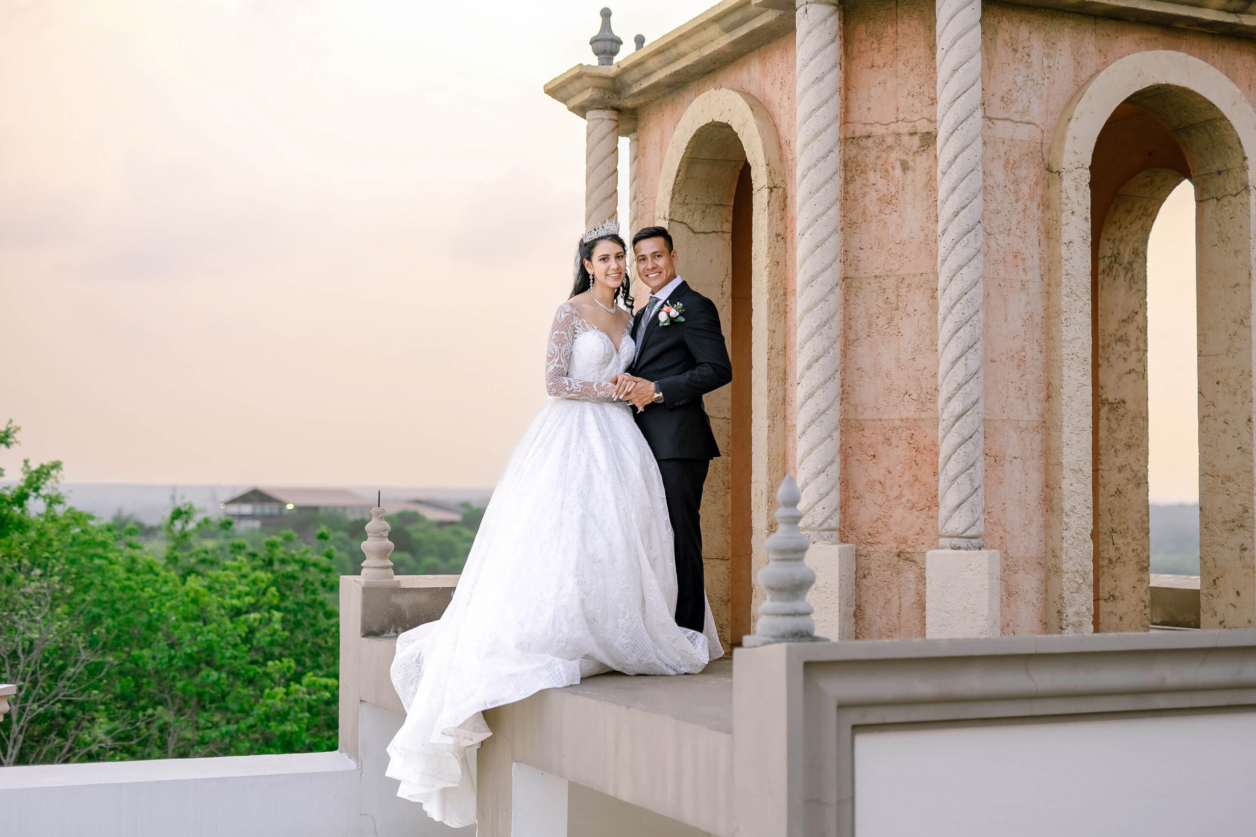 Bride and groom posing at the beautiful Stoney Ridge villa Terrace