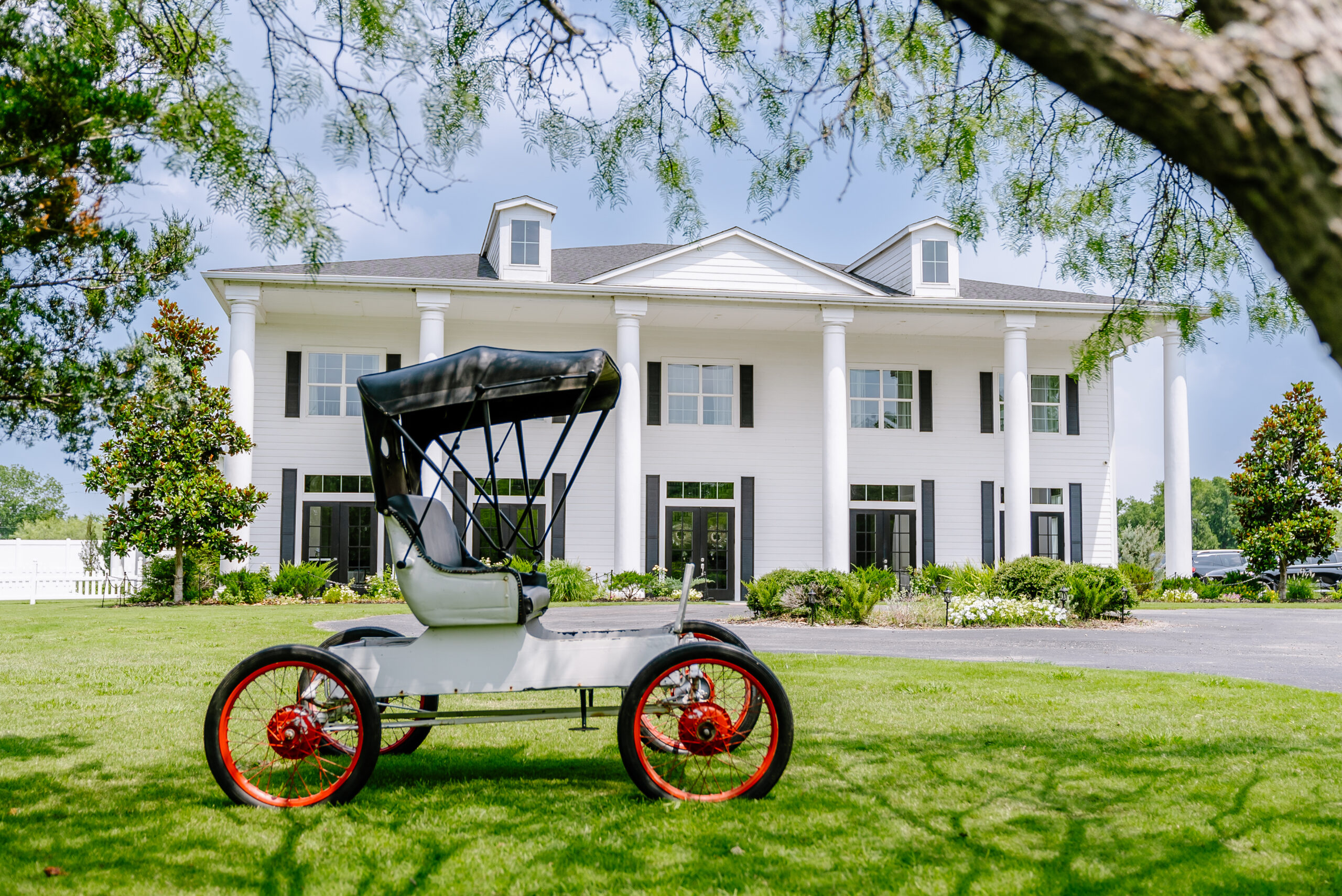 The outside shot the beautiful mansion at The Pearl at Sabine Creek