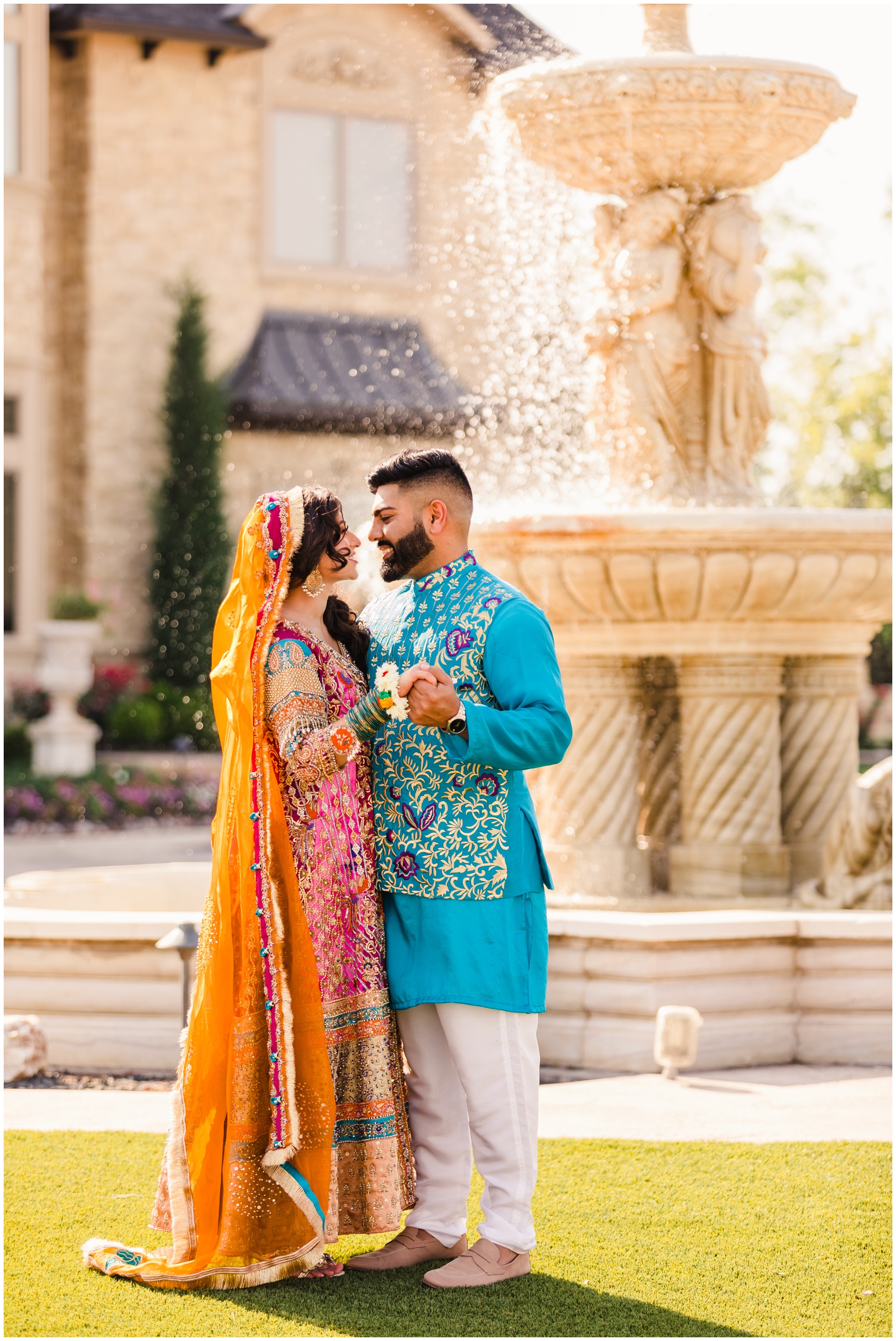 Newlyweds share a dance by the garden fountain during their Knotting Hill Place Wedding