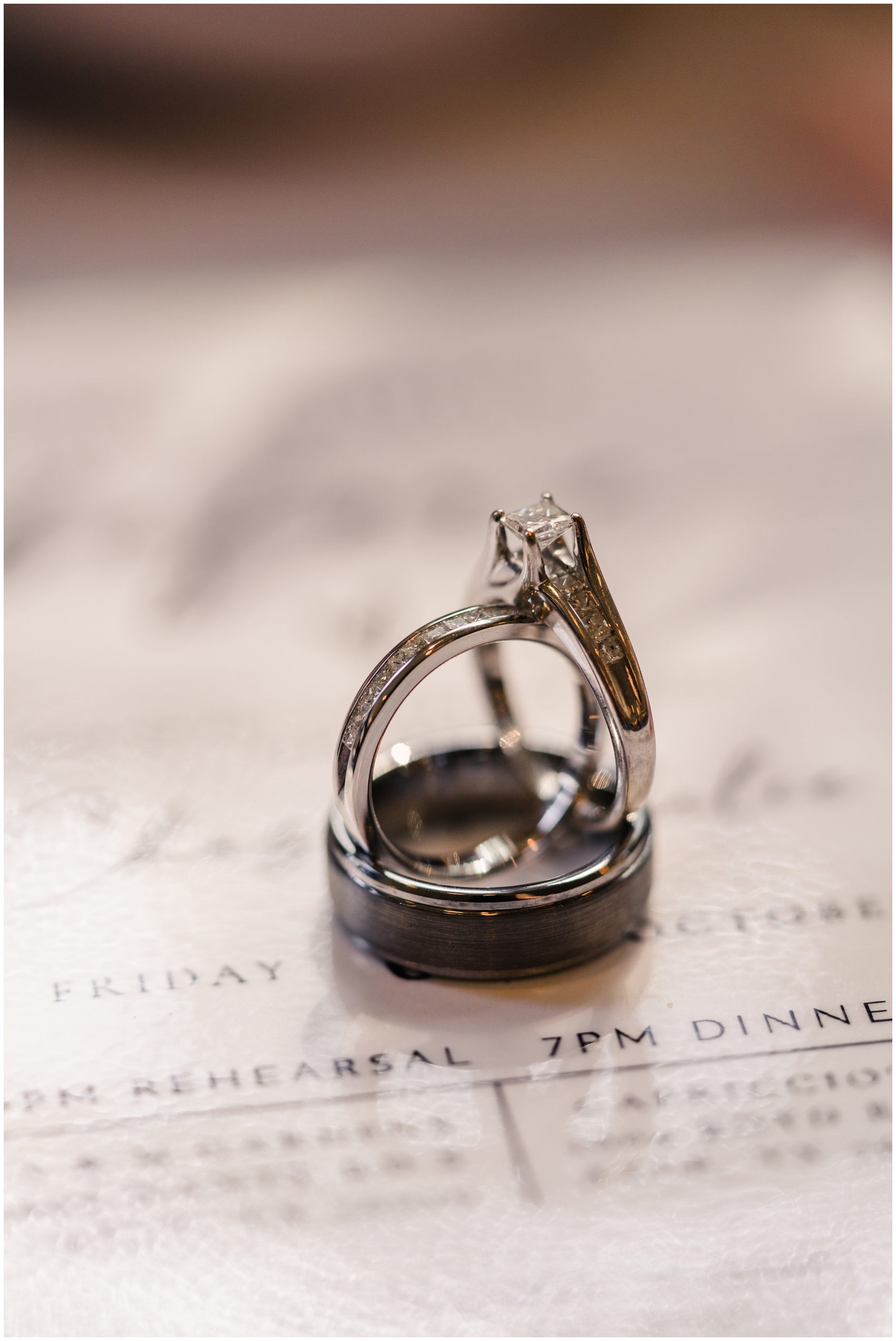 Details of wedding rings on an invitation