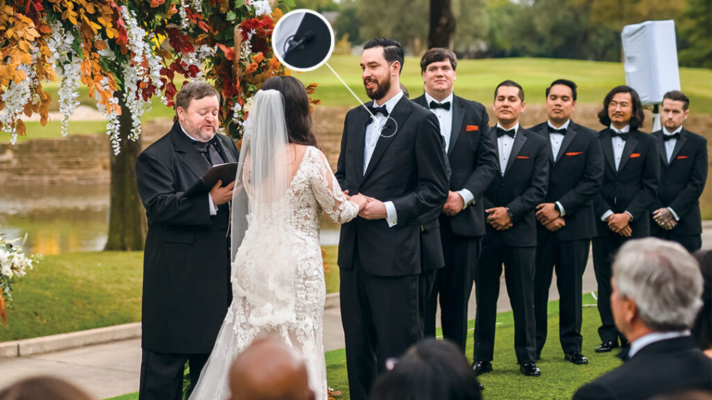 Groom wearing a microphone during wedding vows for clear ceremony audio